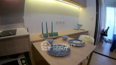 Modern kitchen with sleek dining setup and stylish decor