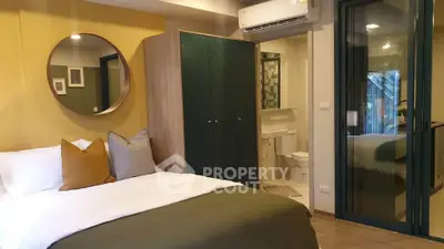Modern bedroom with ensuite bathroom and stylish decor