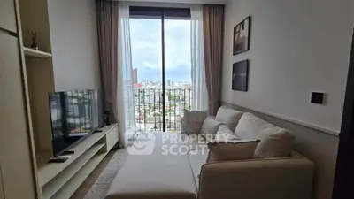 Modern living room with city view and cozy sofa in high-rise apartment
