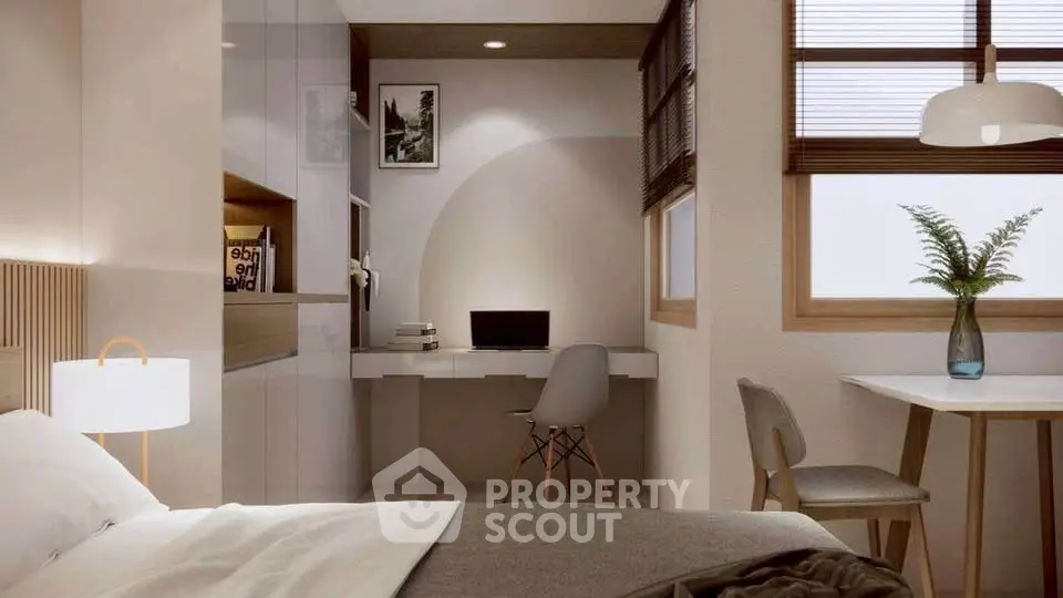 Modern bedroom with study area, featuring sleek furniture and natural light, perfect for urban living.