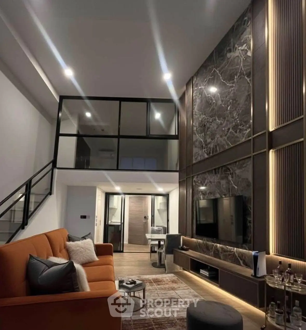 Luxurious modern living room with high ceilings and elegant decor