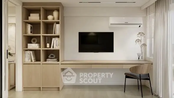 Modern study room with built-in shelving, sleek desk, and wall-mounted TV in a minimalist design.