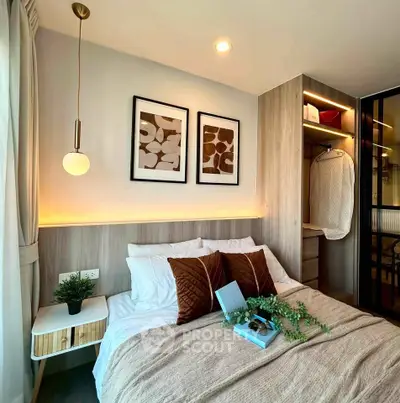 Cozy modern bedroom with stylish decor and built-in wardrobe