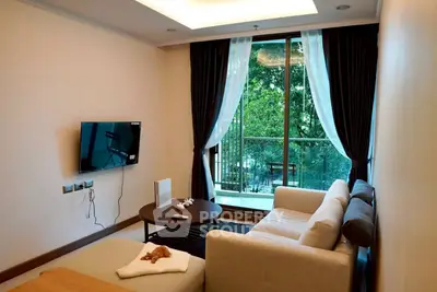 Modern living room with large window and balcony view, featuring cozy sofa and wall-mounted TV.
