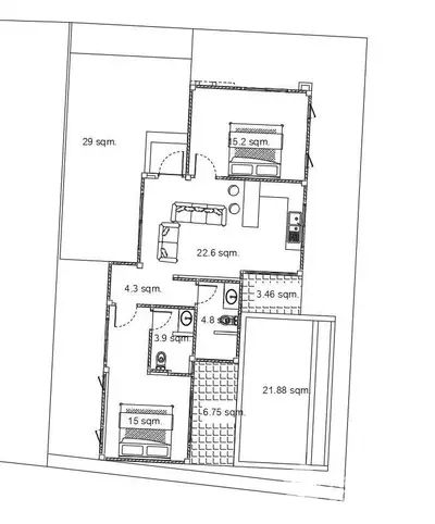 Modern apartment floor plan with spacious living area and multiple bedrooms, ideal for family living.