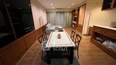 Spacious living room with elegant dining area and modern furnishings