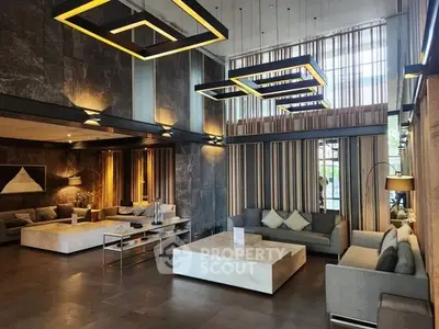 Luxurious modern living room with high ceilings and stylish lighting