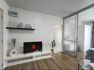 Modern living room with sleek TV setup and stylish decor