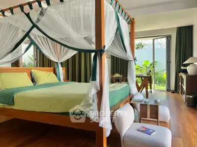 Luxurious bedroom with canopy bed and garden view, featuring elegant decor and natural light.