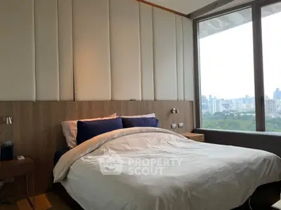 Luxurious bedroom with stunning city view and elegant decor