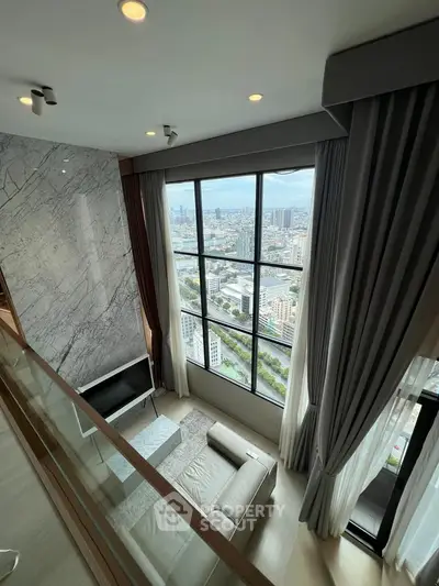 Luxurious high-rise living room with stunning city view and modern decor
