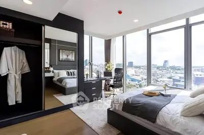 Luxurious bedroom with panoramic city views and modern decor