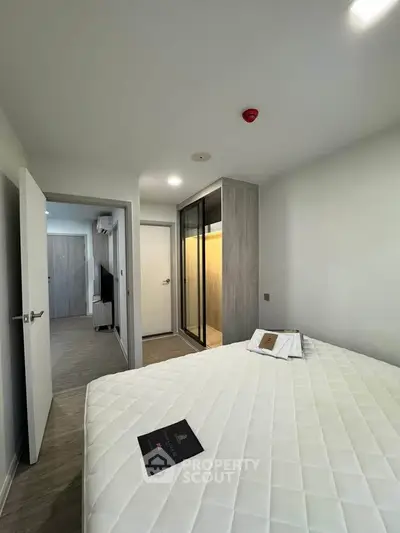 Modern bedroom with sleek design and spacious closet