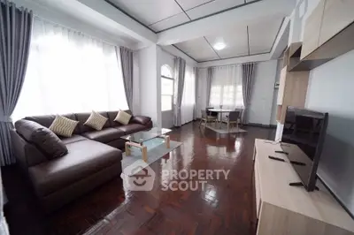 Spacious living room with modern furniture and natural light