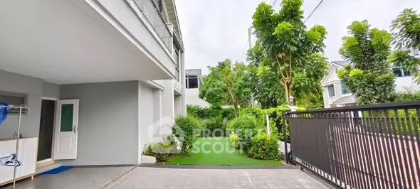 Spacious modern home with lush garden and secure gated entrance