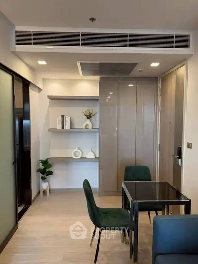 Modern living room with sleek furniture and stylish decor in a contemporary apartment.