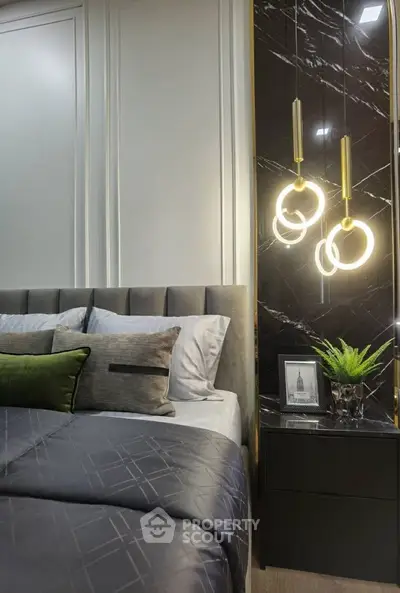 Luxurious bedroom with elegant lighting and modern decor
