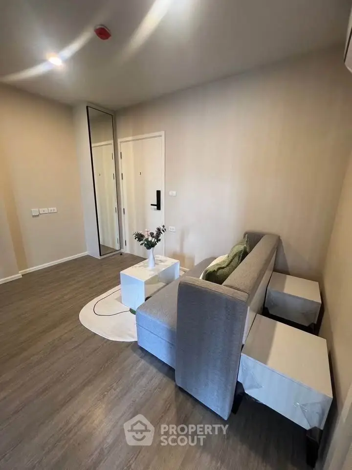 Modern living room with stylish sofa and minimalist decor