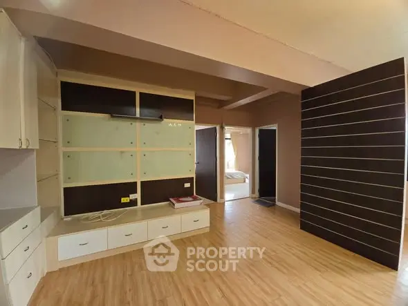 Spacious living room with modern design and wooden flooring