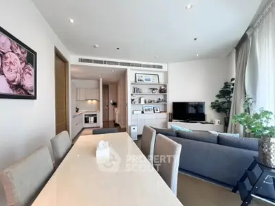 Spacious modern living room with open kitchen and elegant dining area