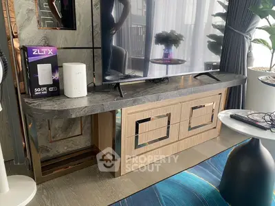 Modern living room with sleek TV stand and contemporary decor