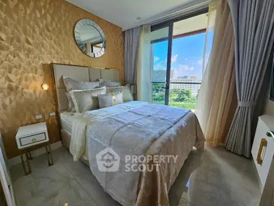 Luxurious bedroom with elegant decor and stunning city view from large window.