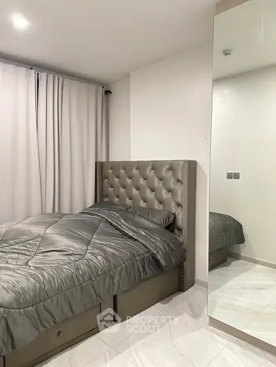 Luxurious bedroom with elegant tufted headboard and modern decor