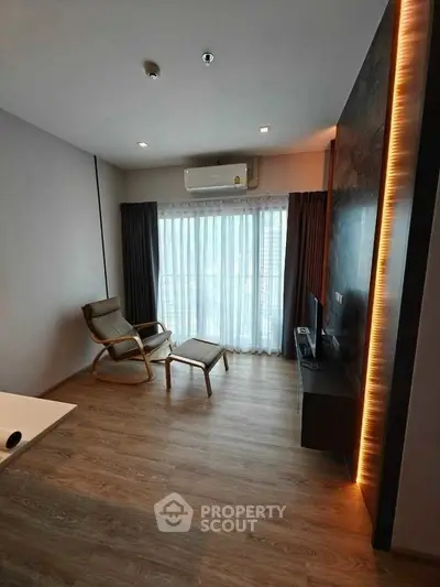 Modern living room with sleek furniture and natural light