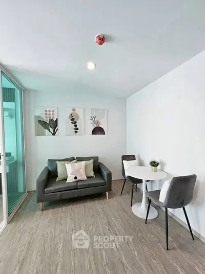 Modern living room with stylish decor and cozy seating area