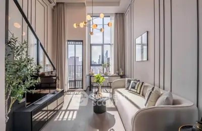 Luxurious modern living room with high ceilings and city view, featuring elegant decor and ample natural light.