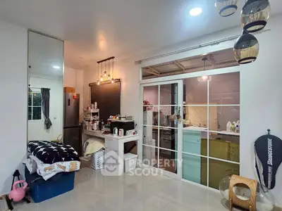 Charming interior with modern kitchen and cozy living area, perfect for urban living.