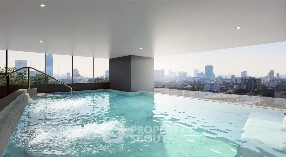 Luxurious indoor pool with stunning city skyline view