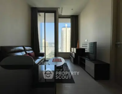 Modern living room with city view, sleek furniture, and natural light.