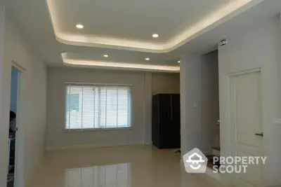 Modern interior with recessed lighting and sleek design in a spacious room