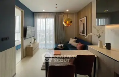 Modern living room with stylish decor and large window view