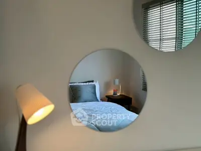 Cozy bedroom with modern decor and stylish lighting