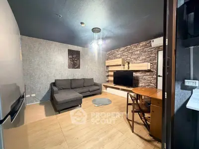 Modern living room with stylish decor and comfortable seating in a contemporary apartment.