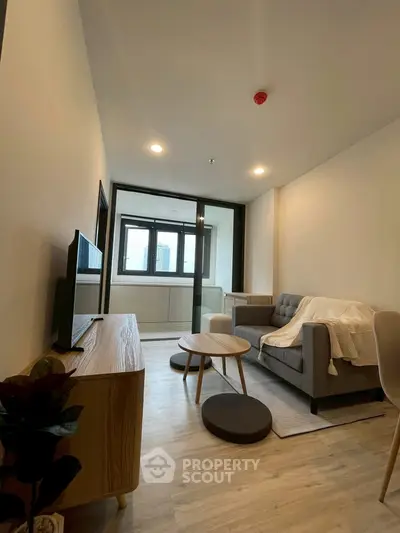 Modern living room with cozy sofa and stylish decor