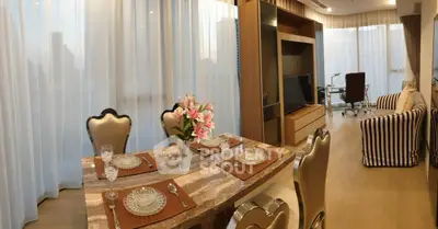 Luxurious living room with elegant dining area and modern decor