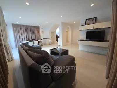 Spacious modern living room with sleek furniture and elegant decor