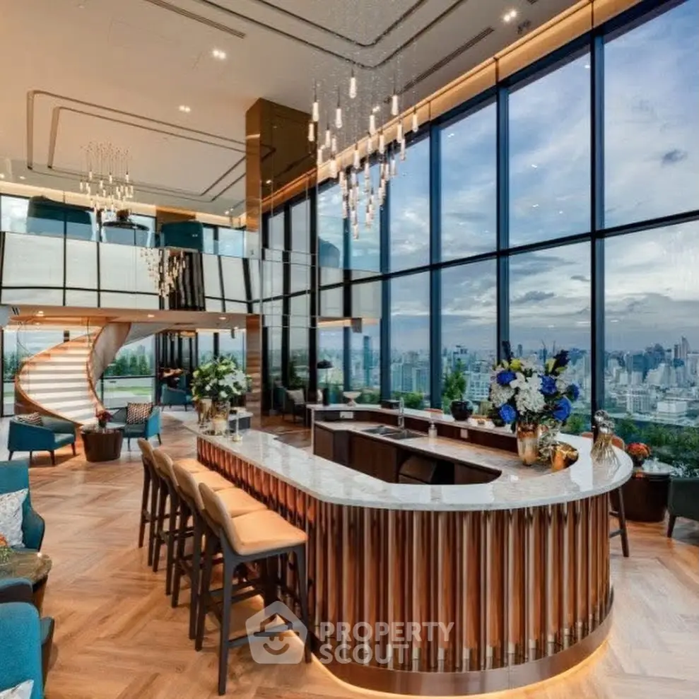 Luxurious penthouse with stunning city view and elegant spiral staircase