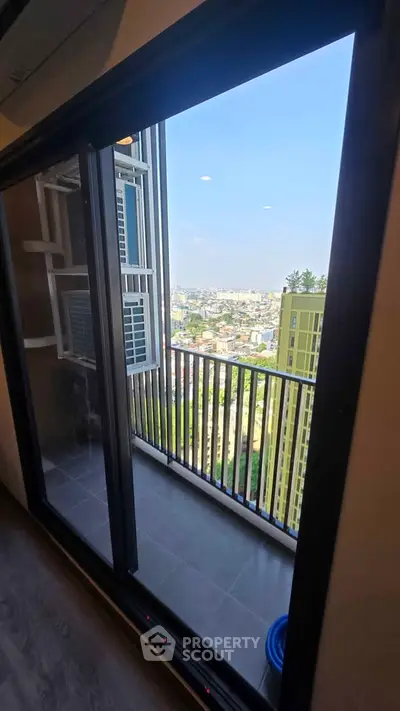 Stunning high-rise balcony view with cityscape and modern design, perfect for urban living.