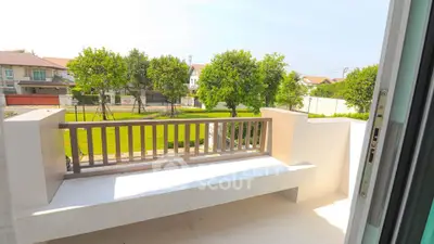 Charming balcony with garden view in suburban home