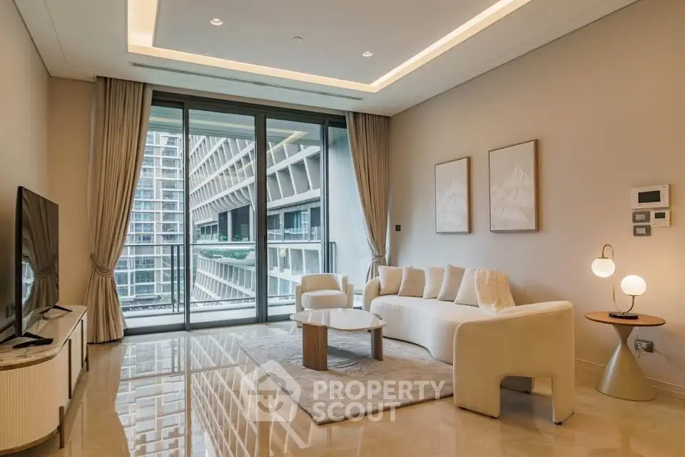Luxurious modern living room with floor-to-ceiling windows and elegant decor in high-rise apartment.