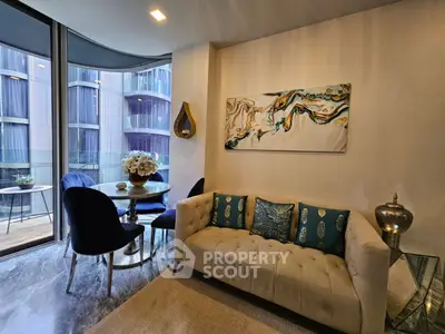 Stylish modern living room with elegant decor and balcony view