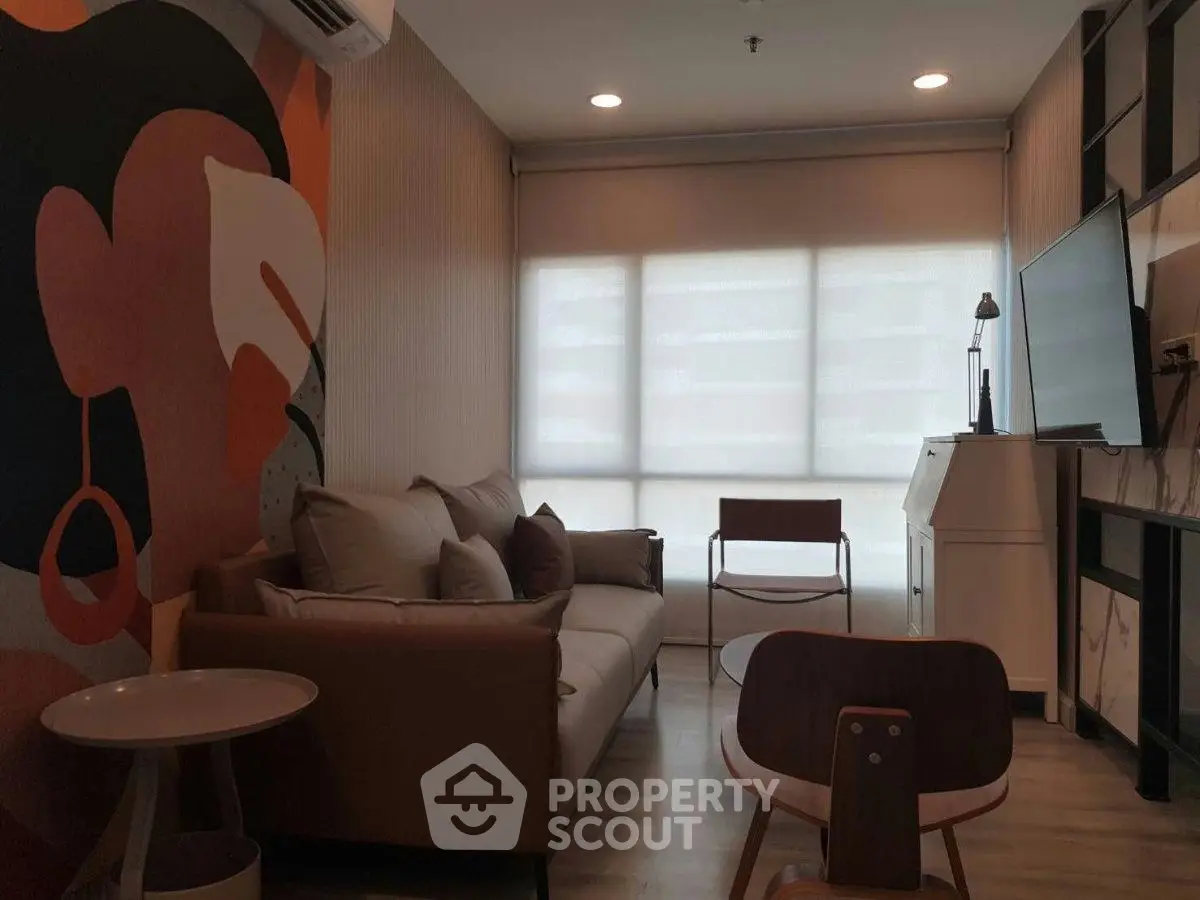 Modern living room with stylish decor and natural light