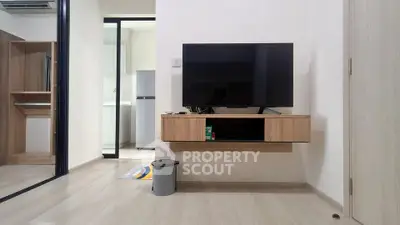 Modern living room with sleek TV setup and minimalist decor