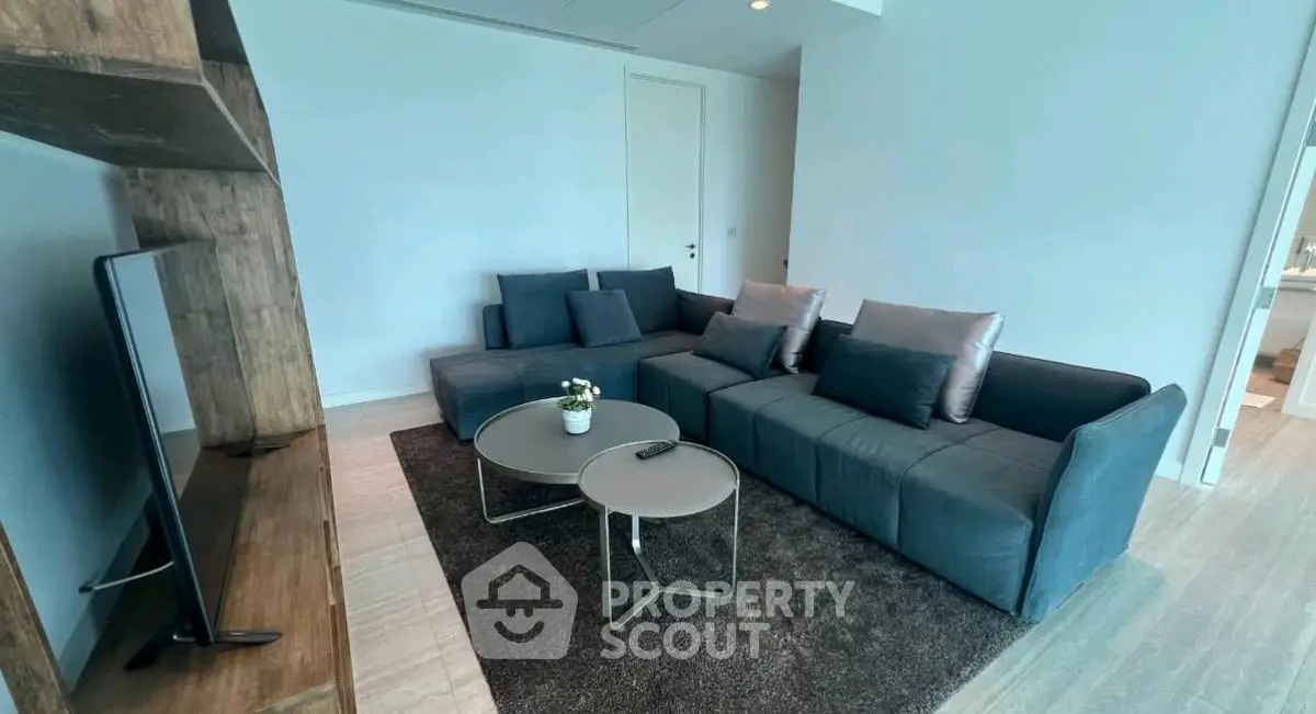 Modern living room with sleek furniture and cozy ambiance