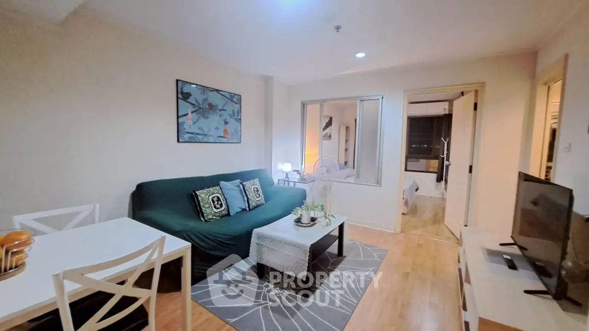 Cozy living room with modern decor and open layout in stylish apartment