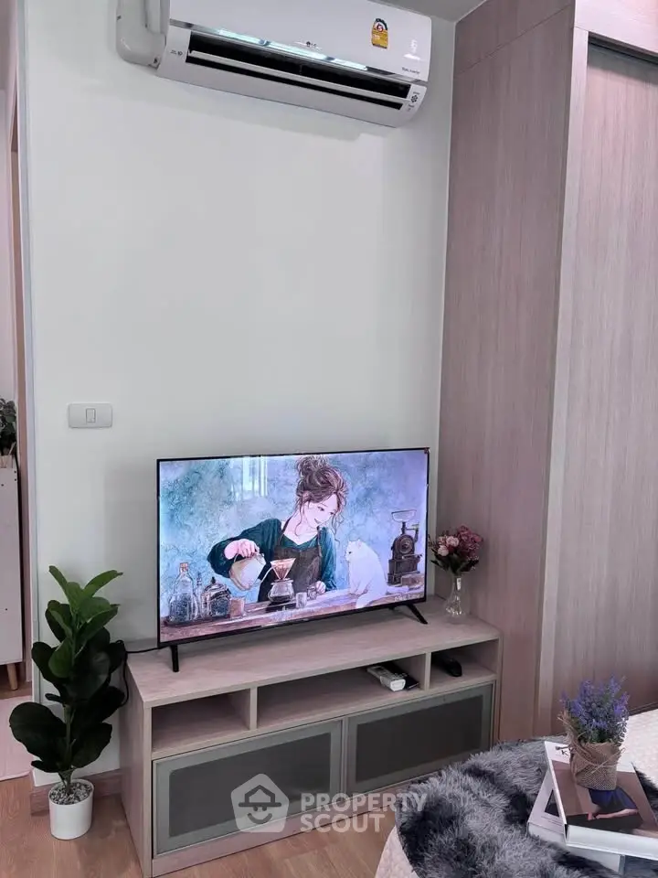 Modern living room with air conditioning and stylish TV setup